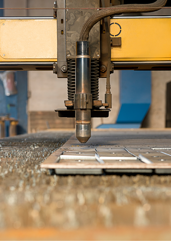 Plasma cutting cnc machine at a factory cutting aluminium sheet