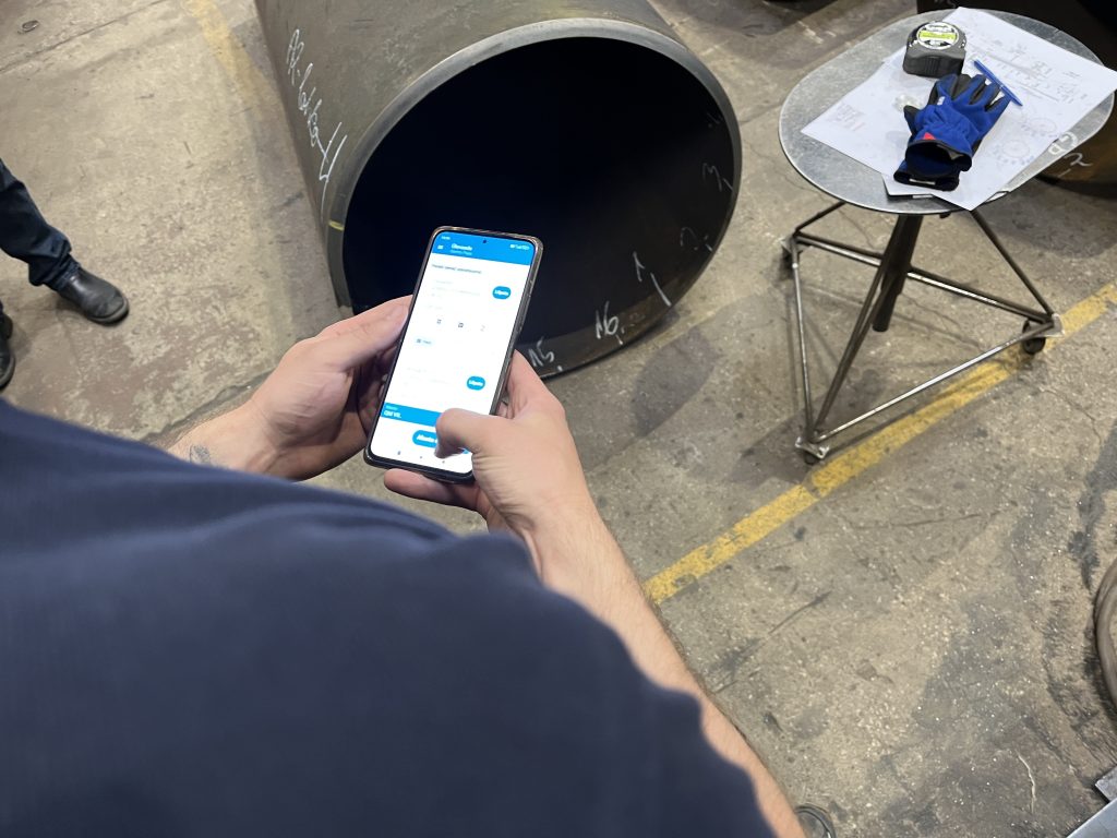 EZIIL shop floor mobile reporting operator in a steel shop